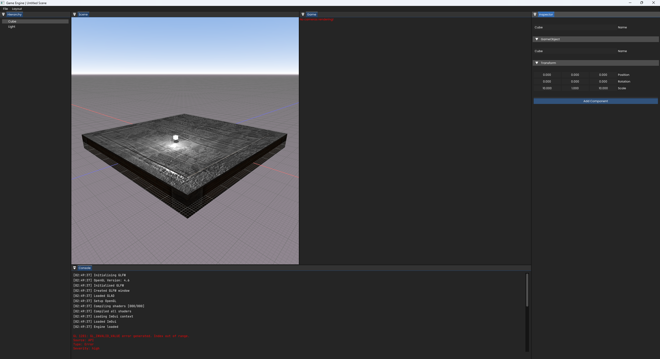 An image of a game engine showing a scene with a box and a light source